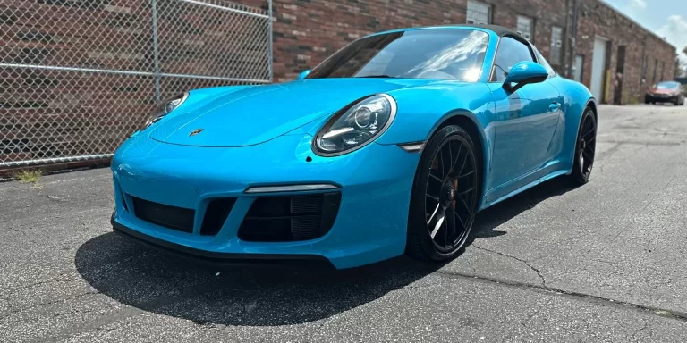 Porsche 911 Targa 4 GTS parked outside of the Nathan's Detailing shop