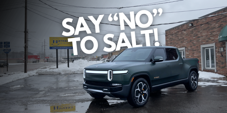 A Rivian parked out from of our detailing shop with the caption "Say no to salt!" referring to protecting your vehicle from road salt this year.